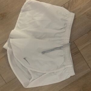 White Nike shorts